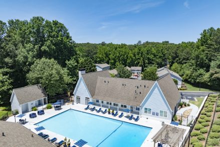 Aerial view of the pool and clubhouse at Dunwoody Glen Apartment Homes