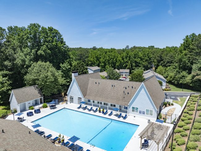 Aerial view of the pool and clubhouse at Dunwoody Glen Apartment Homes