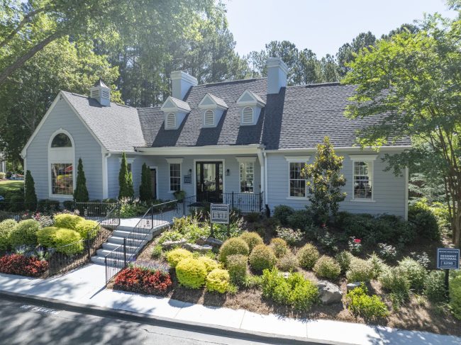 Exterior of the leasing office at Manchester at Mansell Apartments